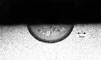 Fig. 5. Transverse section of a melt run produced in helium at a pressure of 500bar at 2.6kW with a welding speed of 0.6m/min