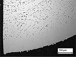 Fig.6a) Transverse section showing elimination of porosity and cracking