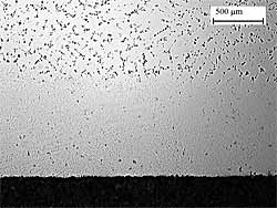 Fig.7. Crack and porosity free deposit ~0.8mm thick on the 3mm diameter test specimen