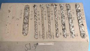 Figure 2. Siliceous aggregate. Laser passes at 4000W on a dry surface