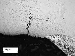 Fig.3c. Shallow (45µm) intergranular crack in band of ferrite in HAZ of NWA7 (5 passes, no water cooling and 140°C IPT in high grade steel)