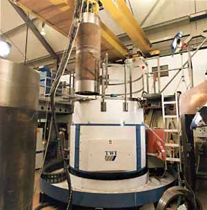 Fig.4. Laboratory prototype Reduced Pressure EB pipe welding machine showing 28" diameter pipe being loaded for welding with internal clamp in place