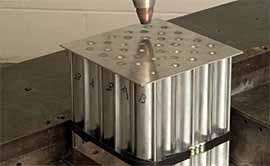 Fig.21. Laser spot welding of an aluminium Ex-Struct TM sandwich panel in TWI's laboratory (Courtesy TWI)