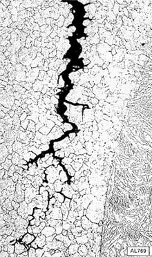 Fig.4. Intergranular cracking in the HAZ of a multipass weld in 11%Cr/1.5%Ni steel, tested as-welded in a sweet brine at 120°C [10]