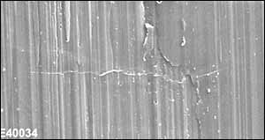 Fig.4. SEM micrograph of replica showing crack initiation not obviously related to surface flaws, Specimen 04, crack TB-1, 2c= 0.11mm, N=1,100,000 cycles at 210MPa.