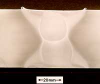 Fig.3 Aluminium alloy 6082 T6 plate double sided friction stir welds. Transverse macrosection showing 50mm thick weld profile, and flow contours made with Whorl™ tool.