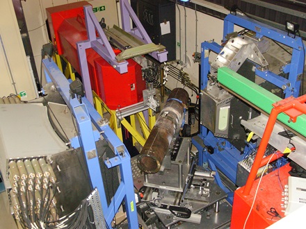 Figure 5 – Residual stress measurement set-up at ISIS a) Set-up for the measurement of axial strains