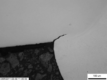 Figure 9a: Left side weld root of specimen BW01-B-PS-1 after exposure in Test 1.