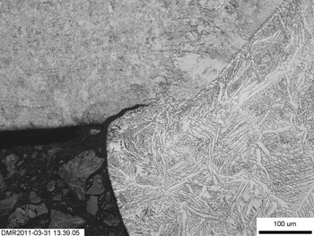 Figure 9b: Left side weld root of specimen BW01-B-PS-1 after exposure in Test 1.
