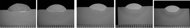 Figure 2. Photomacrographs of transverse sections of single-weld-bead produced by increasing the welding speed from 40, 60, 100, 120, and 140mm/min. Note the different magnifications in the photographs.