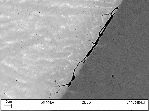 Figure 4 - SEM backscatter image of retrieved subsea 8630-625 joint (8630 alloy is shown on the right).