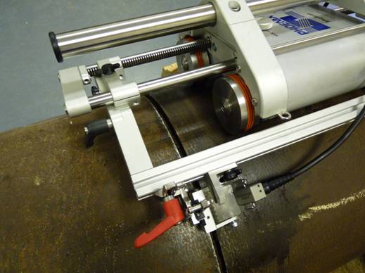 Figure 3 The 10MHz array probe connected to the scanning arm of the MAGSCAN and positioned to implement a phased array technique.