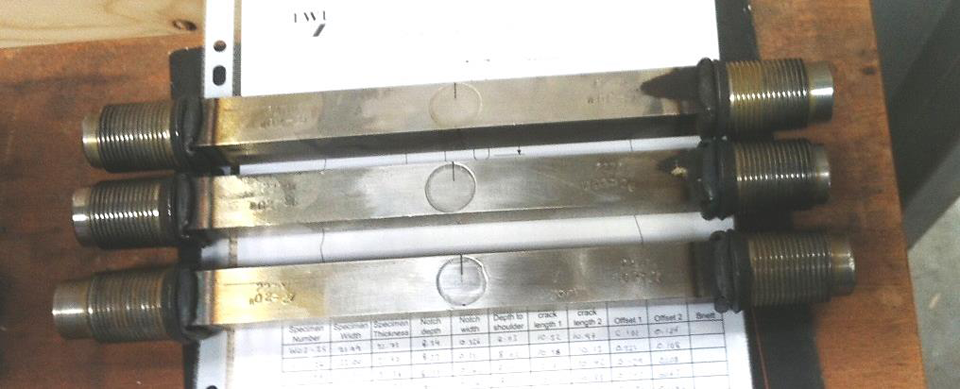 Figure 16 Threaded end SENT specimens after notching and pre-cracking ready to test inside the temperature controlled chamber.