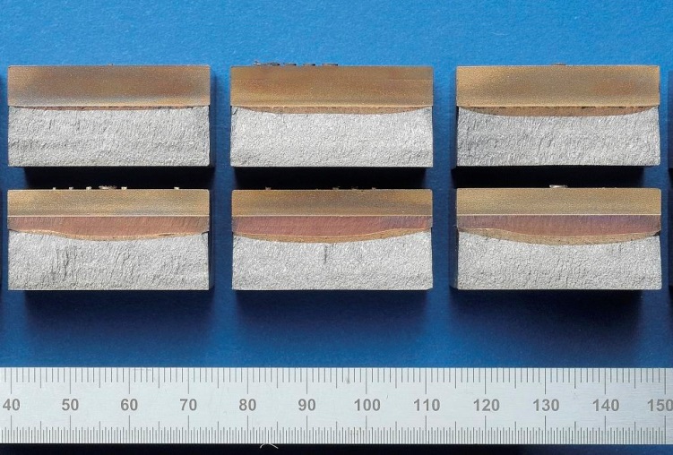 Figure 5. A selection of the fracture faces from SENT specimens tested for the multiple specimen R-curves, notched with EDM alone (top) and with fatigue precracking (below). All specimens had nominal a/W ratio of 0.4.