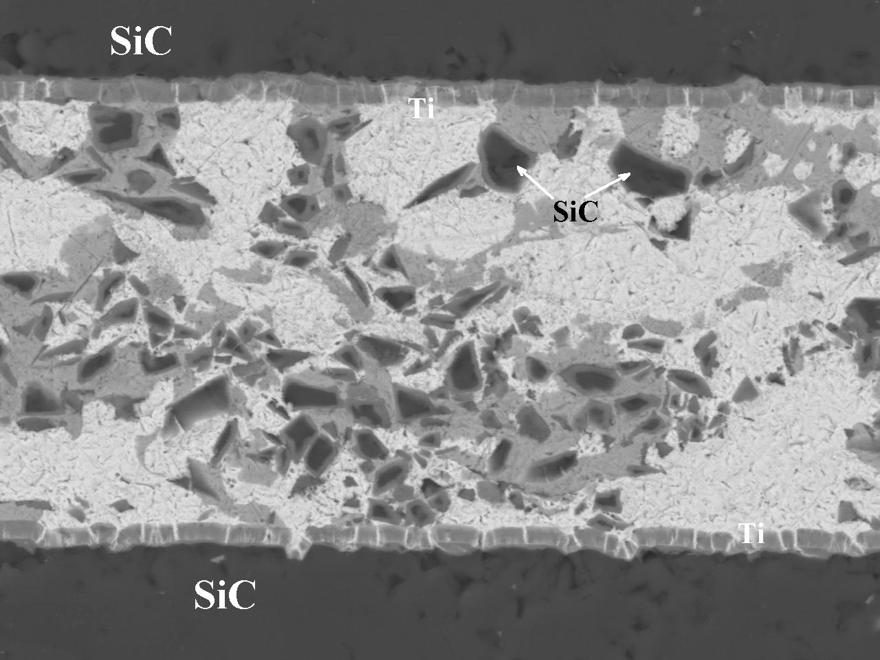 Cross-section of a ceramic-reinforced brazed joint in silicon carbide; brazed with Cu-Ag-Ti-10%SiC