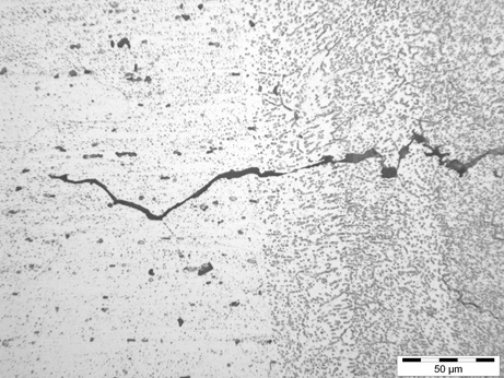 Crack in EB welded aluminim alloy 6061 (weld metal, right; parent material, left)