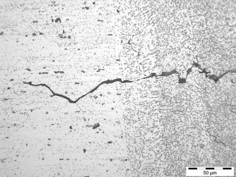 Crack in EB welded aluminim alloy 6061 (weld metal, right; parent material, left)