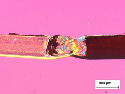 Figure 12: µFSW butt weld of dissimilar thermoplastic sheet materials – cross section showing polymer mixing