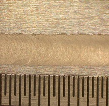 Figure 8: Lap weld between two 300μm thick sheets of aluminium alloy - Top surface of short length of weld (11mm)