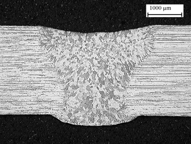 Typical cross section of EB welding in aluminium alloy before machining of weld cap.