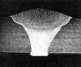  Fig.1. Weld metal porosity in Al-Mg alloy arc welds: Fig.1a) MIG weld, x5