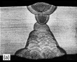 Fig.3. Solidification cracking: a) in the root beads of a multi-run weld