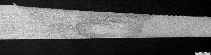 Fig. 1: Cross section of an FSW joint between AA6082-T6 plates with thicknesses of 3mm and 5mm.