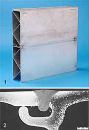 Example of a hybrid butt weld demonstrator made between two 300mm long hollow extrusions (1), and a cross-section through the welded joint (2), made at 5m/min. Scale bar-2mm