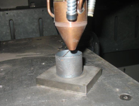 Cylindrical tubular sleeve being manufactured using laser deposition