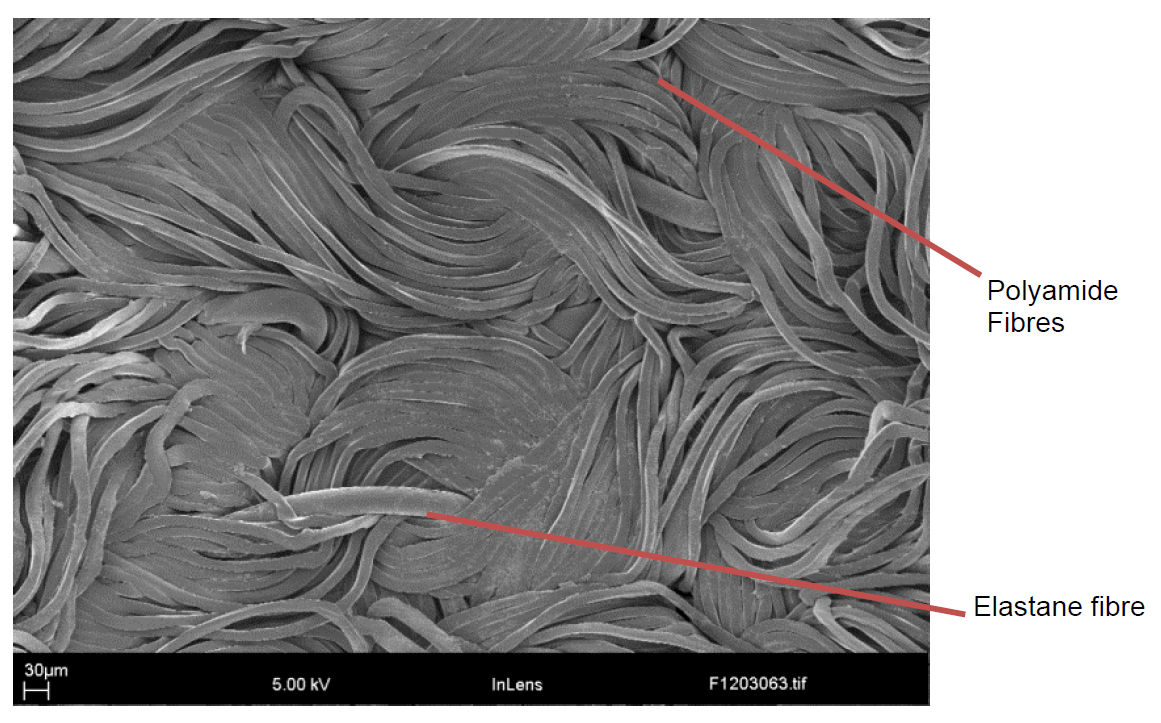 Fig 3 SEM image of a melted spot of fabric.
