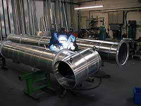 Welding of fabricated 'T' to 20" diameter spiral welded aluminium tube 