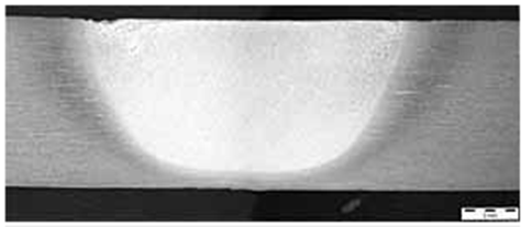 Figures 4a and 4b: The surface of a Ti-6Al-4V weld (top) and macrostructure of a weld (bottom) made with SSFSW tool