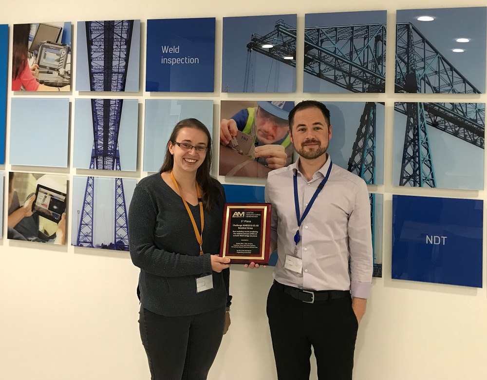 Madie Allen, National Structural Integrity Research Centre (NSIRC) student at Brunel University London and Tyler London, Team Manager, Numerical Modelling and Optimisation, TWI Ltd, with the team's AM-Bench Challenge award. 